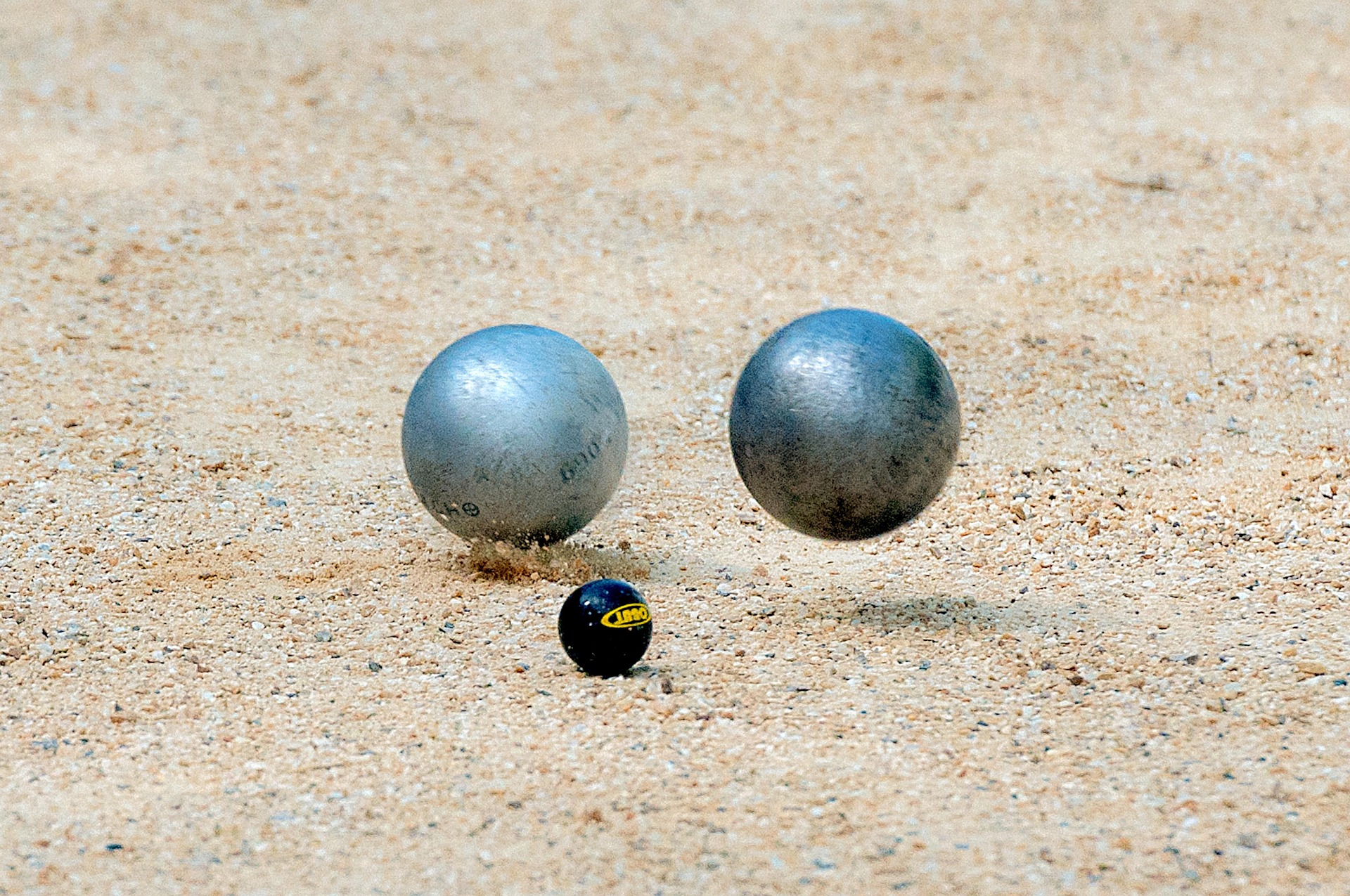 Pétanque players in the village square